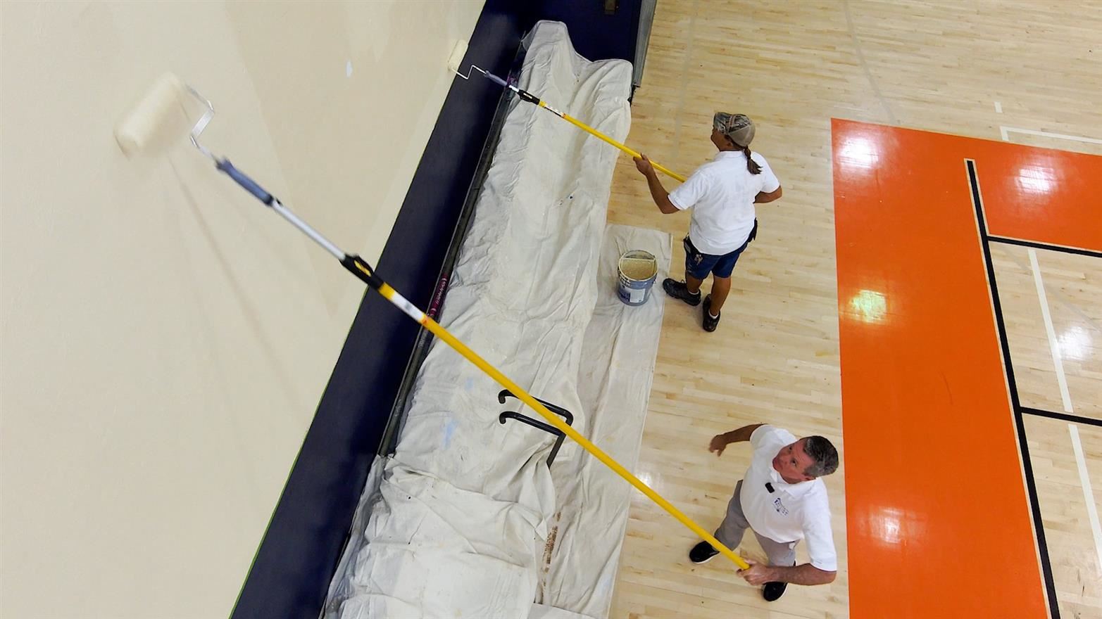  Burke painting a Gym